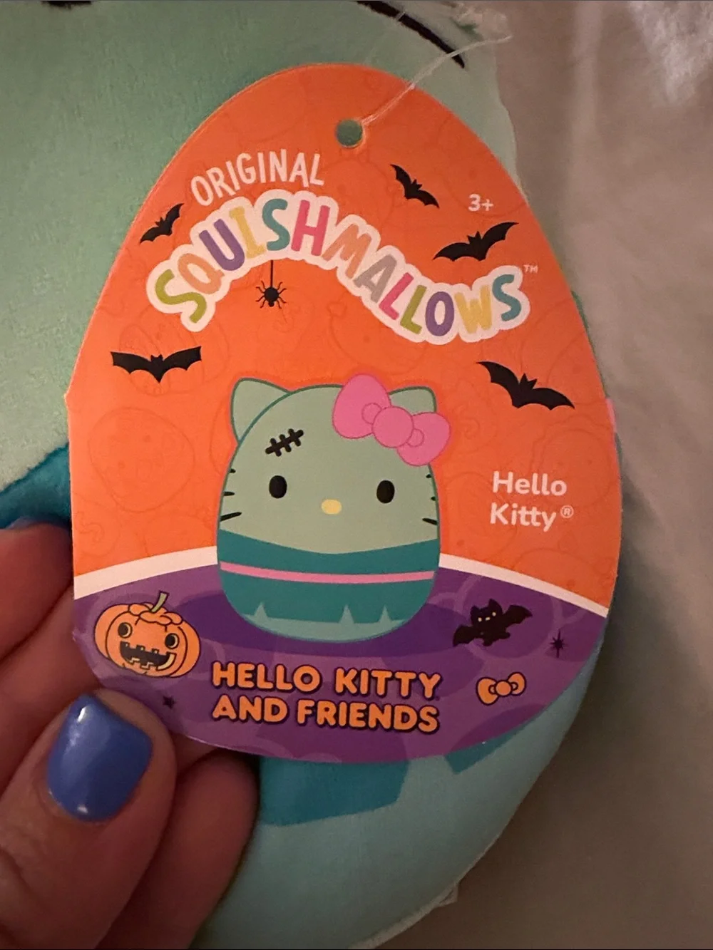 Squishmallows Mint Green & Teal Hello Kitty Plush with Pink Bow